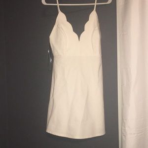 White scalloped dress